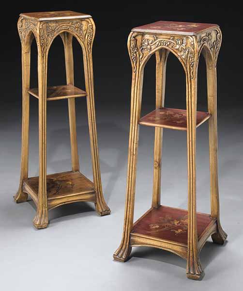 Appraisal: A Pair of Art Nouveau-Style Inlaid and Carved Stands after