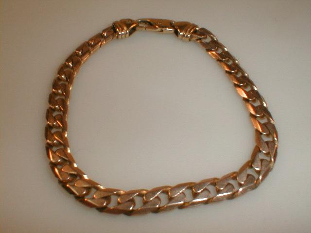 Appraisal: A gents curb link bracelet marked for ct g