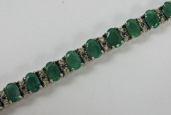 Appraisal: EMERALD DIAMOND AND K WHITE GOLD BRACELET in length and