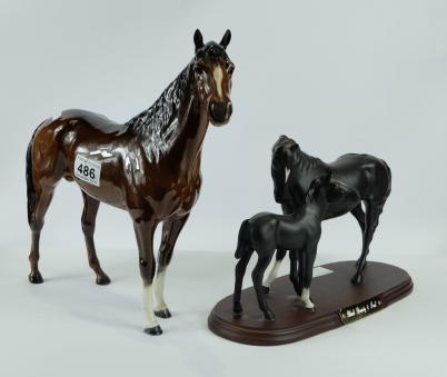 Appraisal: Beswick Large huntsmen horse and connoisseur Black beauty and foal