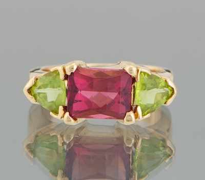 Appraisal: A Ladies' Garnet and Peridot Ring k yellow gold ring