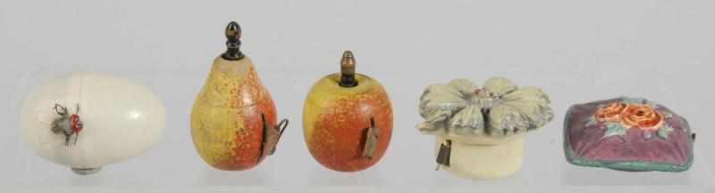 Appraisal: Lot of Figural Sewing Tape Measures Description Includes one egg