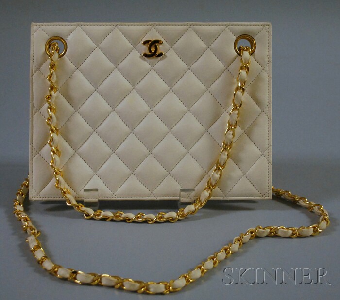 Appraisal: Chanel Cream Quilted Lambskin Handbag with gold-tone chain and lambskin