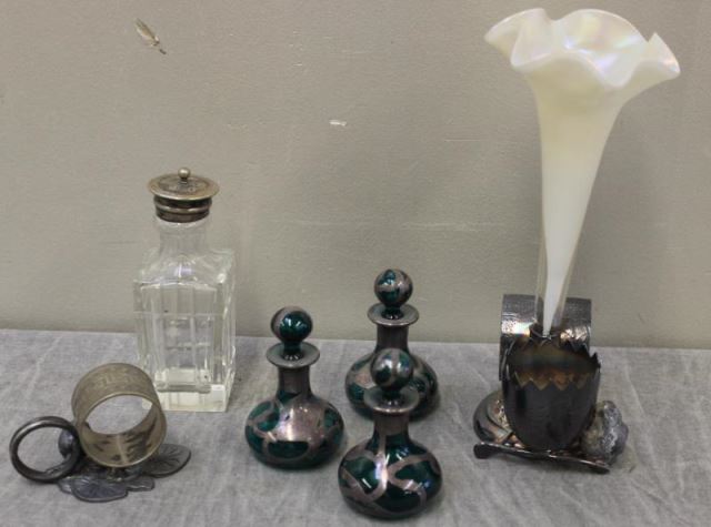 Appraisal: Silverplate and Glass Lot Includes perfumes and napkin rings From