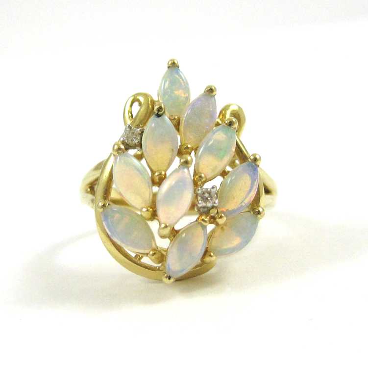 Appraisal: OPAL DIAMOND AND K GOLD CLUSTER RING The signed yellow