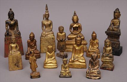 Appraisal: FOURTEEN THAI CARVED GILTWOOD AND GILT-METAL BUDDHA FIGURES to in