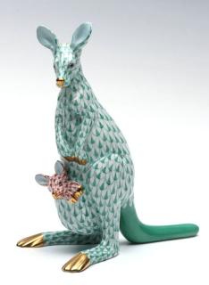 Appraisal: Mother kangaroo in green fishnet pattern and a baby in