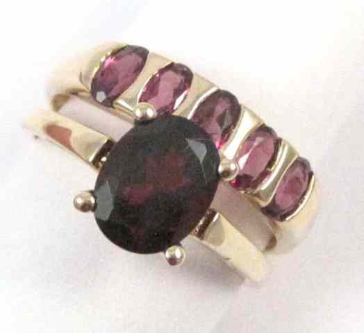 Appraisal: TWO GARNET AND TEN KARAT GOLD RINGS one set with