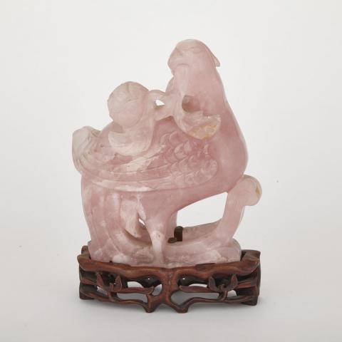 Appraisal: ROSE QUARTZ Bird Republic Period With its head turned holding