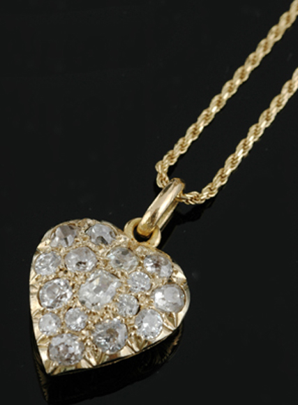 Appraisal: An Antique diamond set heart pendant Grain set to the