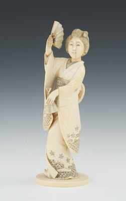 Appraisal: A Carved Ivory Figurine of a Dancing Geisha Standing apprx