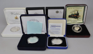 Appraisal: Five boxed proof commemorative five pounds crowns to w an