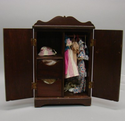 Appraisal: Small Ginny doll size wooden wardrobe Unmarked colonial style wardrob