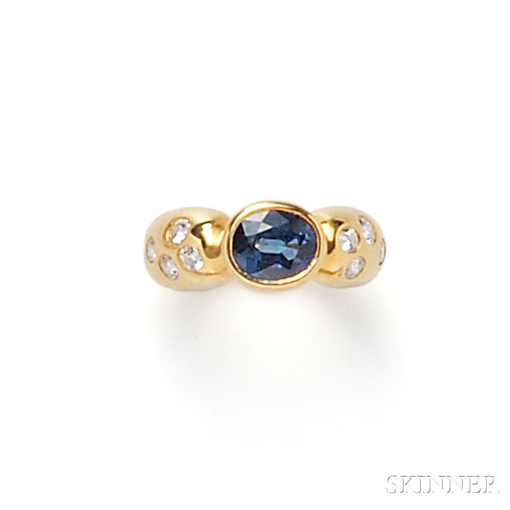 Appraisal: kt Gold Sapphire and Diamond Ring bezel-set with an oval-cut