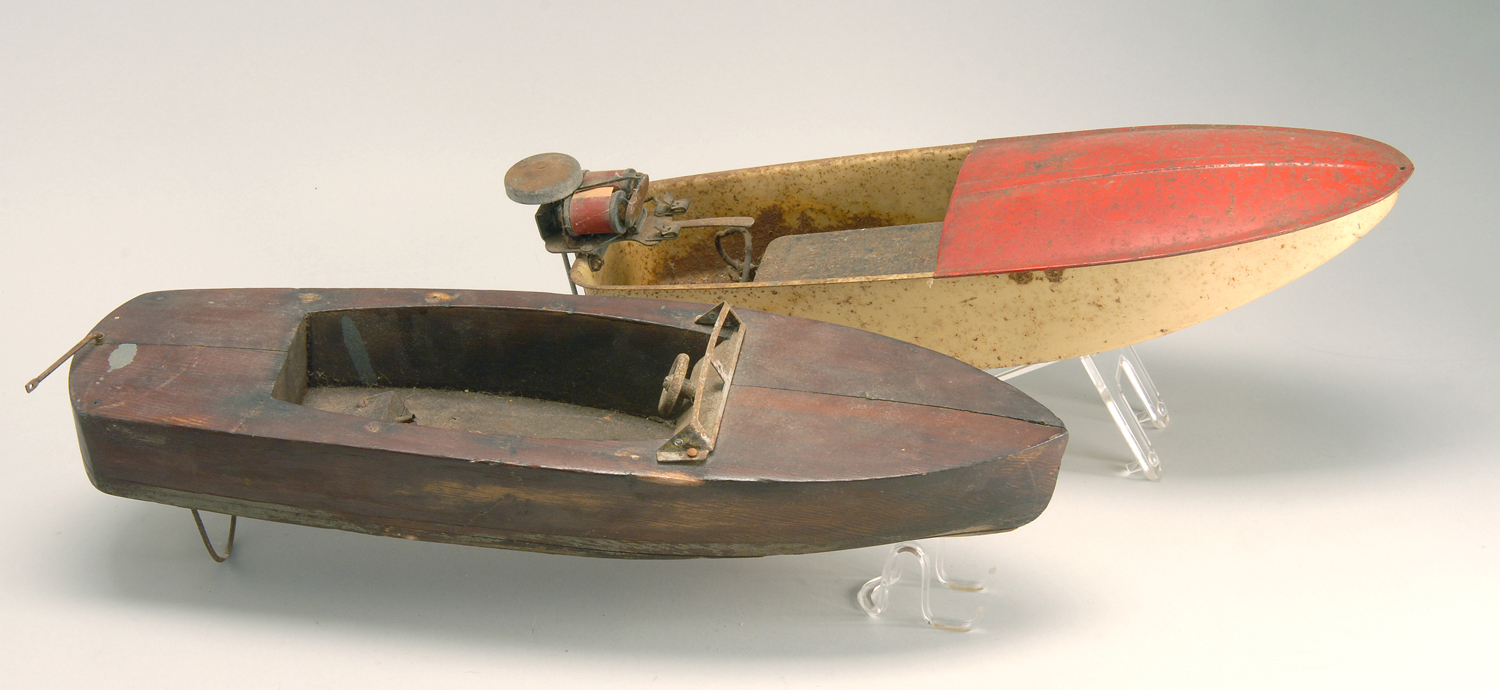 Appraisal: TWO TOY BOATS one tin and one wood Lengths Rust