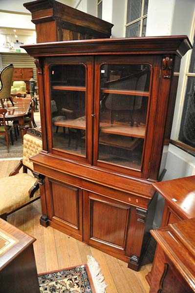 Appraisal: A VICTORIAN MAHOGANY BOOKCASE CABINET key in office