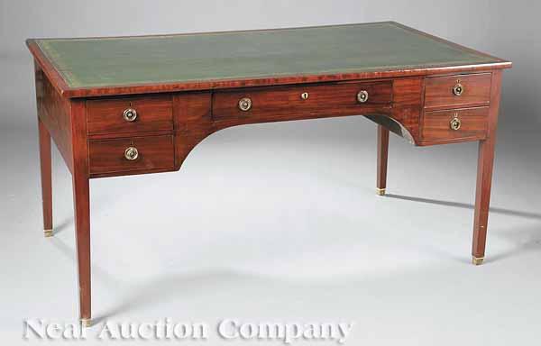 Appraisal: An Antique Regency-Style Mahogany Partner's Desk rectangular top inset with