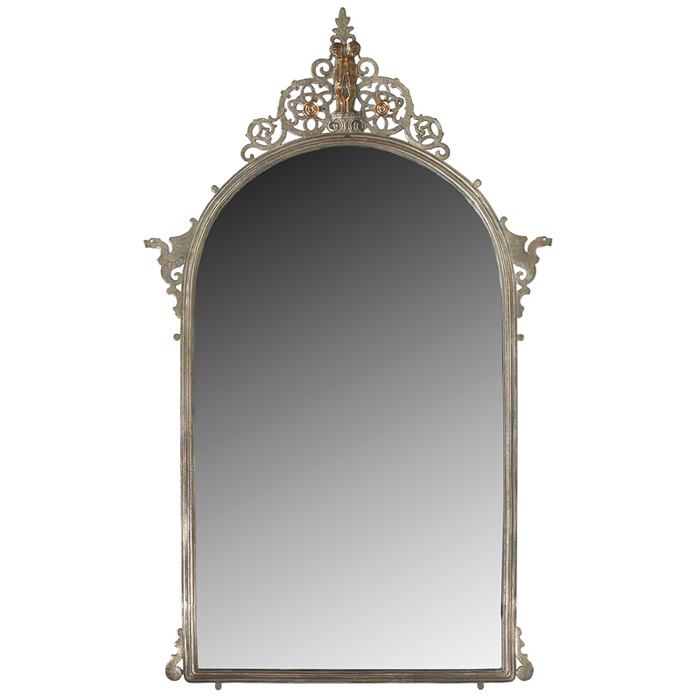 Appraisal: Oscar Bach mirror arched form with reticulated design and applied