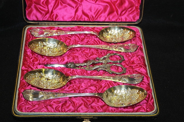 Appraisal: A SET OF FOUR SILVER PLATED BERRY SPOONS with embossed