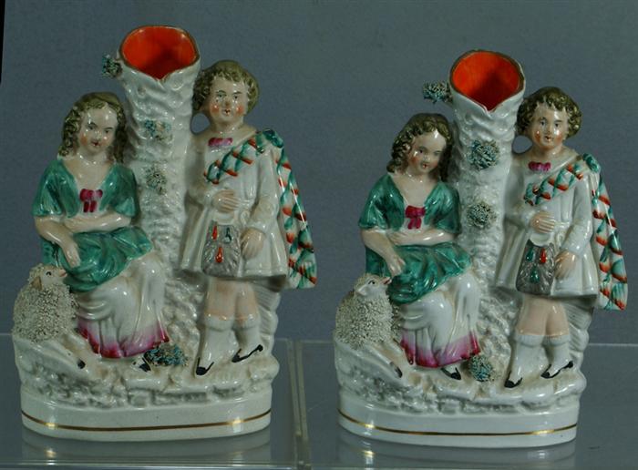 Appraisal: English Staffordshire pair of figural groups of a young Scottish