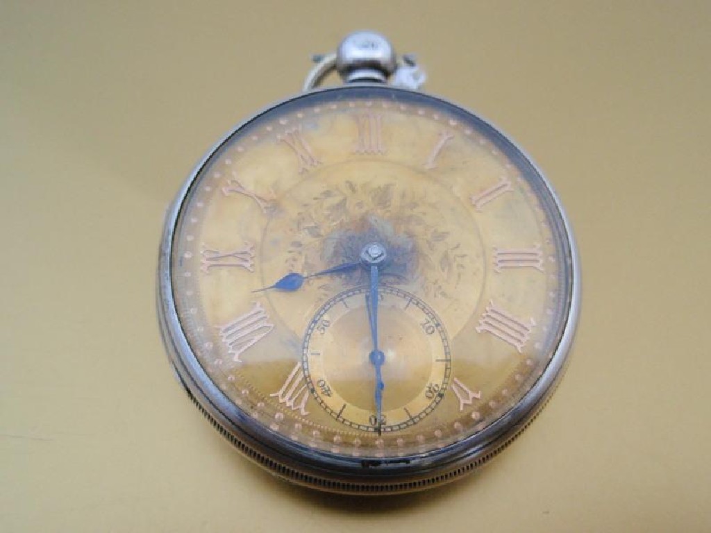 Appraisal: An open face silver pocket watch with gold damascened dial