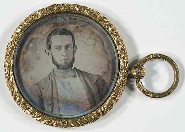 Appraisal: Daguerreian Pendant Featuring Portrait of Bearded Young Man diam gold-filled