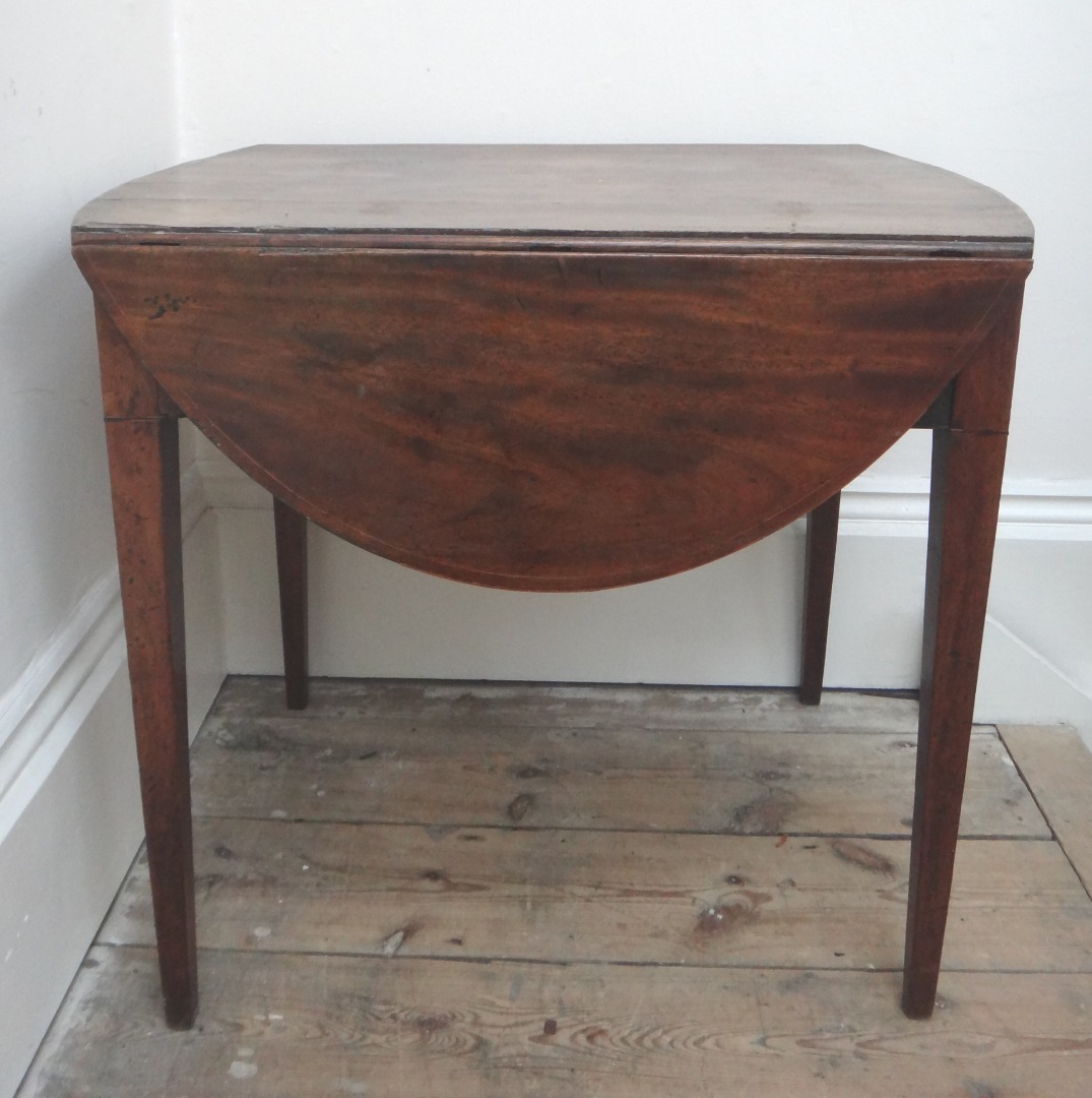 Appraisal: A George III mahogany boxwood strung Pembroke table on square