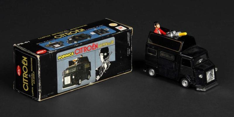 Appraisal: Lupin Citro n Popinika Die-Cast Vehicle Description Japanese Made by