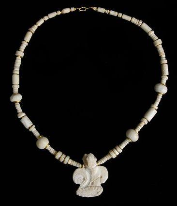 Appraisal: PRE-COLUMBIAN SHELL NECKLACE Strand of shell beads of round cylindrical