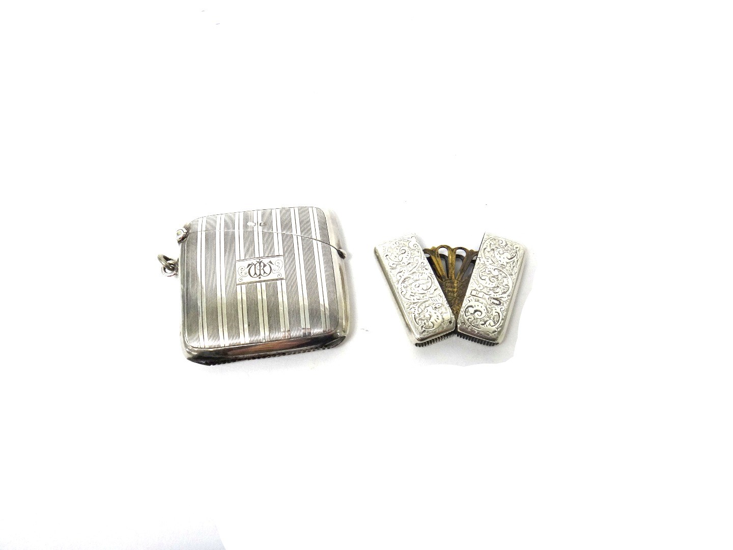 Appraisal: A Victorian silver rectangular folding vesta case with a fitted