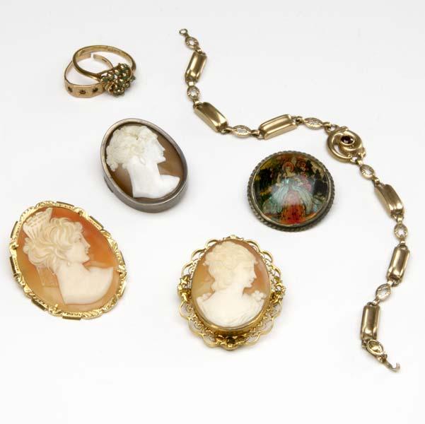 Appraisal: ANTIQUE JEWELRY Collection includes three shell cameos reverse painted silver