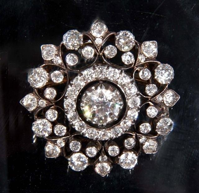 Appraisal: A VICTORIAN DIAMOND SET TARGET BROOCH central old European cut