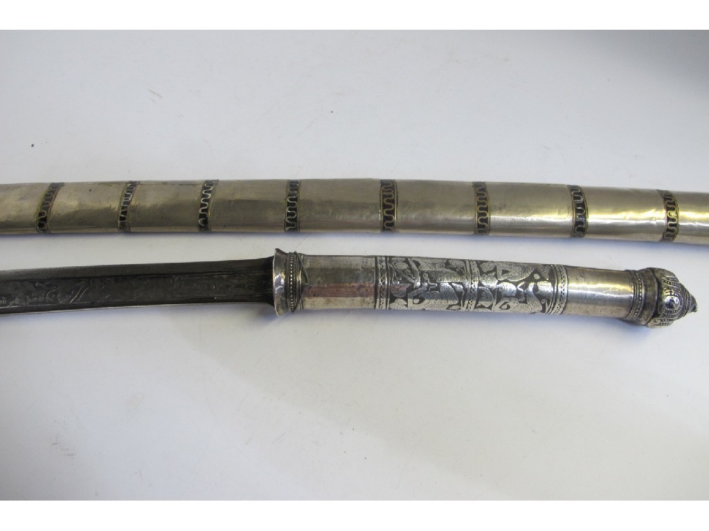 Appraisal: Burmese sword with white metal hilt in white metal scabbard