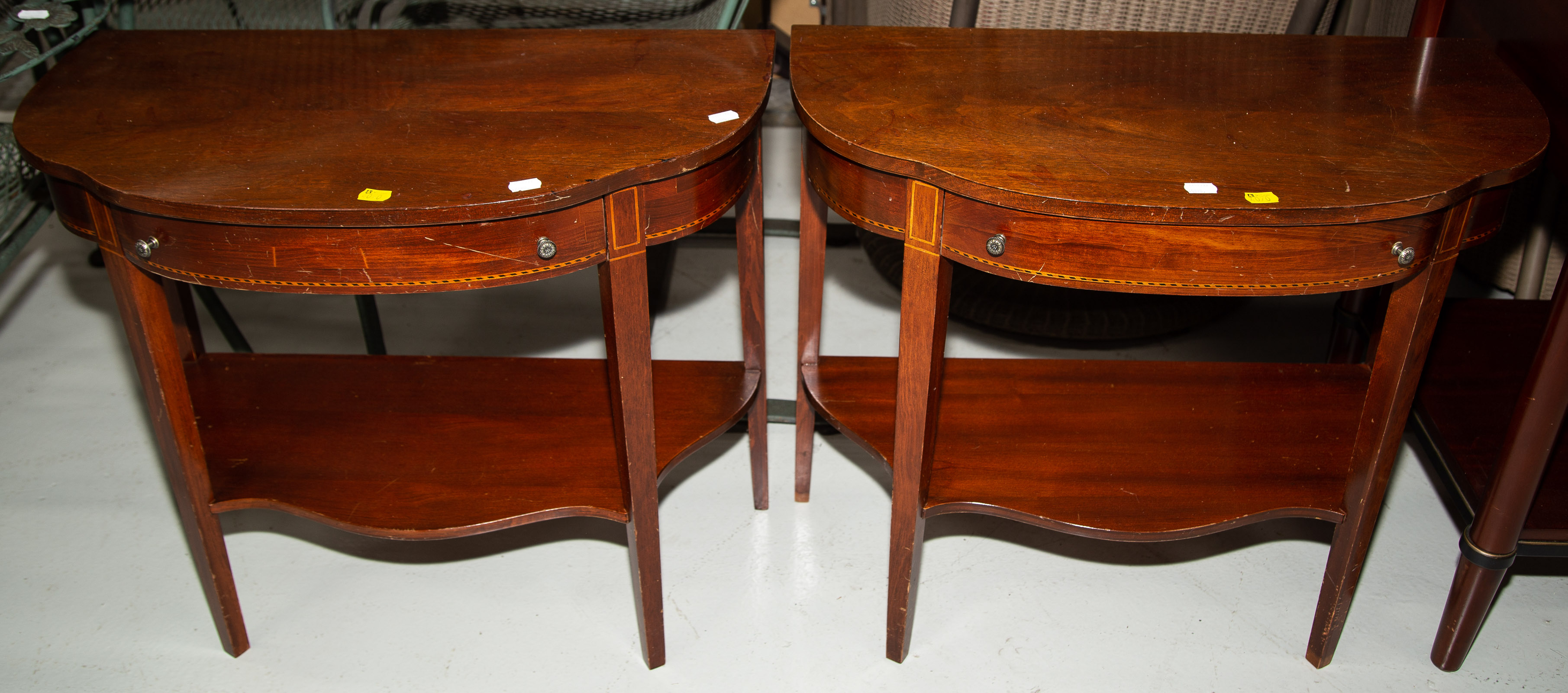 Appraisal: A PAIR OF MAHOGANY NIGHT STANDS WITH BAND INLAY rd