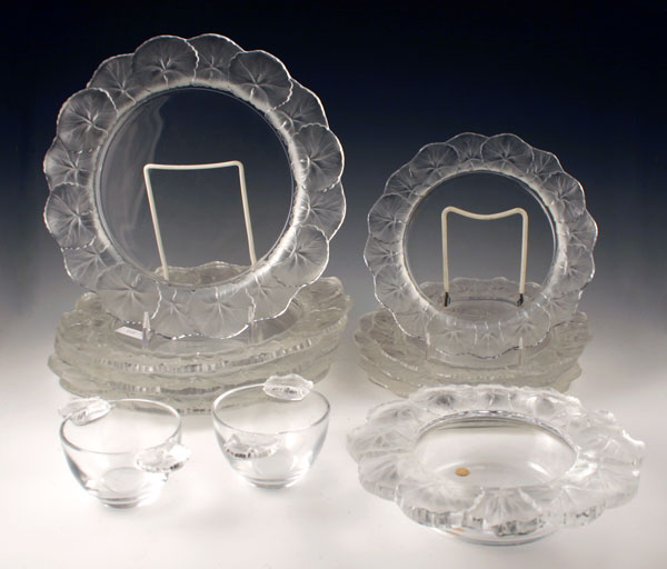 Appraisal: LALIQUE ''HONFLEUR'' FRENCH CRYSTAL SUITE Frosted leaf form rims pieces