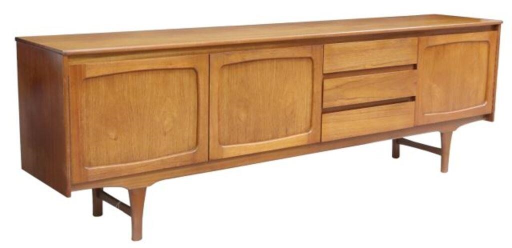 Appraisal: Mid-century modern teak sideboard credenza c s centered fall front