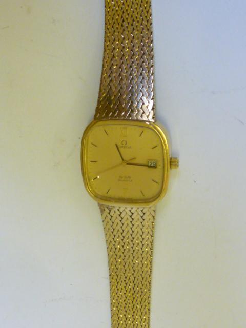 Appraisal: A GENTLEMAN'S CT GOLD OMEGA DE VILLE QUARTZ WRISTWATCH the