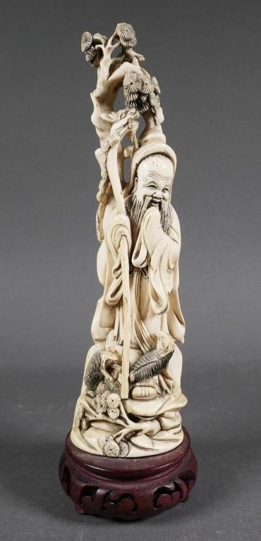 Appraisal: Carved ivory in the shape of Su Wu tending to