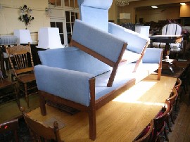 Appraisal: BLUE THREE SEATER DANISH SOFA AND MATCHING ARMCHAIR BY HANS