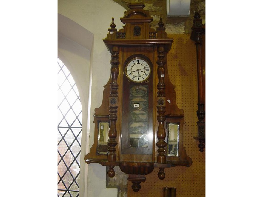 Appraisal: A late th century Vienna regulator wall clock the walnut