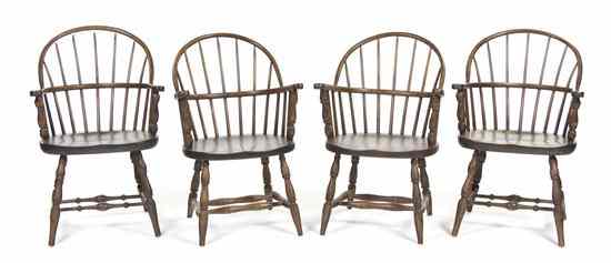 Appraisal: A Set of Four American Oak Windsor Armchairs each having