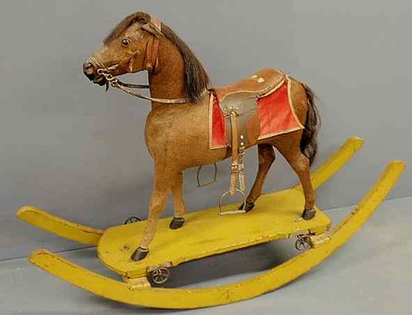 Appraisal: Large German horsehide rocking horse late th c with glass