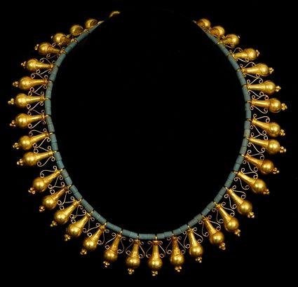 Appraisal: EARLY PERSAIN AMPHORA PENDANT AND BLUE GLASS BEAD NECKLACE Approx