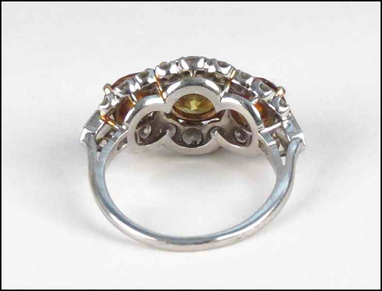 Appraisal: DIAMOND AND PLATINUM RING Comprised of one fancy dark yellow