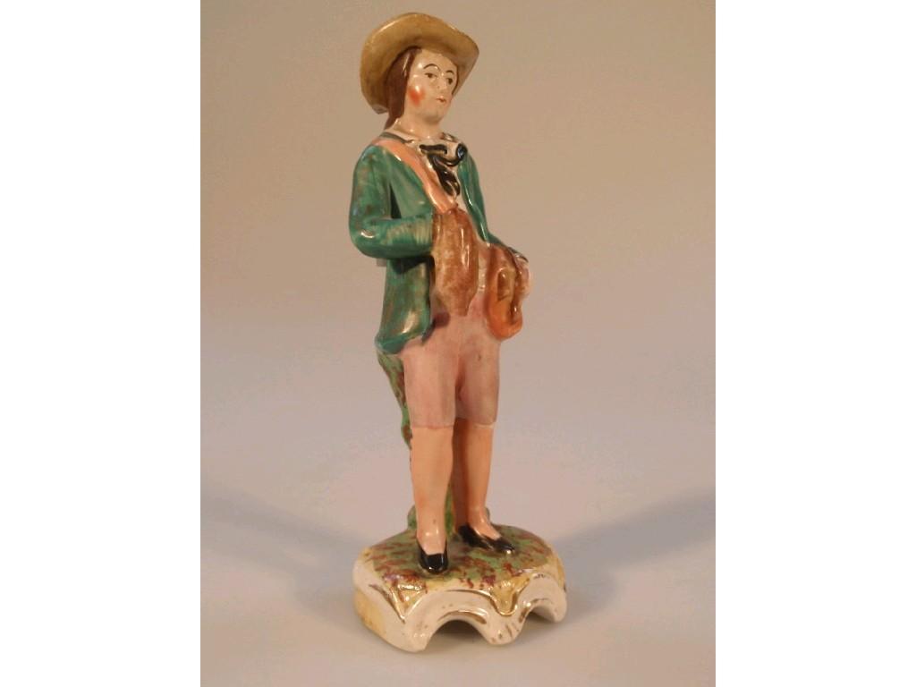 Appraisal: A thC Staffordshire figure of a hunter AF