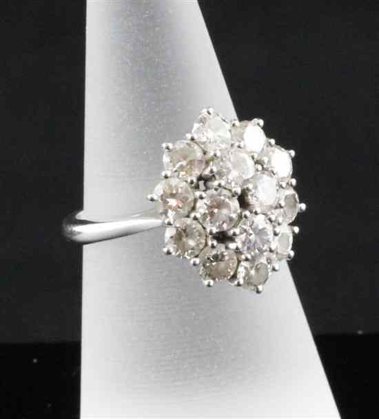 Appraisal: An ct white gold and diamond multi-stone cluster ring set