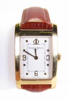 Appraisal: Description A Baume Mercier Hampton K yellow gold wristwatch reference