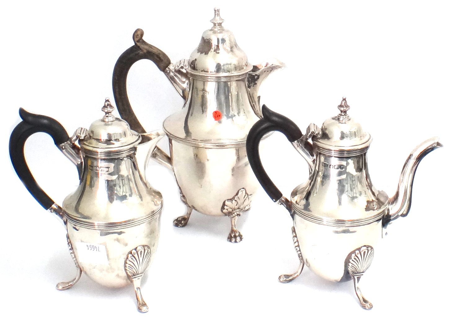 Appraisal: A pair of silver cafe au lait pots Harrison Brothers