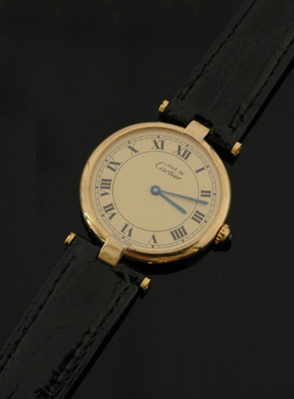 Appraisal: A Gents Cartier wristwatch Quartz circular cream dial with roman