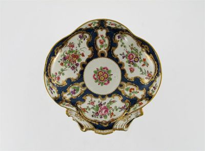 Appraisal: A Worcester shell-shaped dish painted with four large and nine